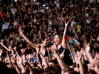 More than 45,000 people attend the concert to raise funds for legal expenses related to the case of the Tempe incident and in memory of the...