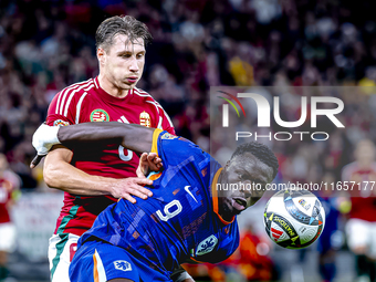 Hungary defender Willi Orban and Netherlands forward Brian Brobbey participate in the match between Hungary and the Netherlands at the Puska...