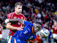 Hungary defender Willi Orban and Netherlands forward Brian Brobbey participate in the match between Hungary and the Netherlands at the Puska...