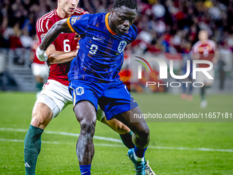 Hungary defender Willi Orban and Netherlands forward Brian Brobbey participate in the match between Hungary and the Netherlands at the Puska...