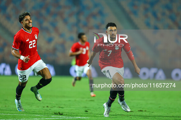 Egyptian national team player Mahmoud Hassan celebrates after scoring a goal during an Africa Cup of Nations qualifying match between Egypt...