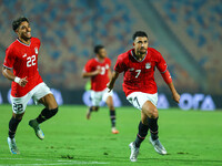 Egyptian national team player Mahmoud Hassan celebrates after scoring a goal during an Africa Cup of Nations qualifying match between Egypt...