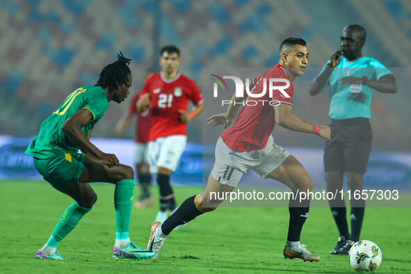 Mostafa Mohamed, a player of the Egyptian national team, is in action during an Africa Cup of Nations qualifying match between Egypt and Mau...