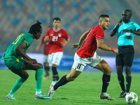 Mostafa Mohamed, a player of the Egyptian national team, is in action during an Africa Cup of Nations qualifying match between Egypt and Mau...