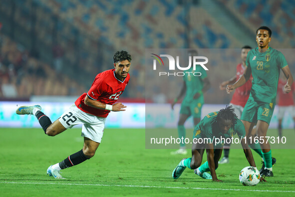 Omar Marmoush, a player of the Egyptian national team, is in action during an Africa Cup of Nations qualifying match between Egypt and Mauri...