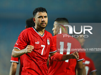 Egyptian national team player Mahmoud Hassan celebrates after scoring a goal during an Africa Cup of Nations qualifying match between Egypt...