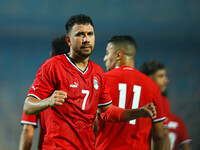 Egyptian national team player Mahmoud Hassan celebrates after scoring a goal during an Africa Cup of Nations qualifying match between Egypt...