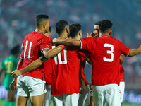 Egyptian national team player Mohamed Salah celebrates with his team after scoring a goal during an Africa Cup of Nations qualifying match b...