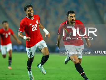 Egyptian national team player Mahmoud Hassan celebrates after scoring a goal during an Africa Cup of Nations qualifying match between Egypt...