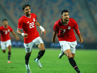 Egyptian national team player Mahmoud Hassan celebrates after scoring a goal during an Africa Cup of Nations qualifying match between Egypt...