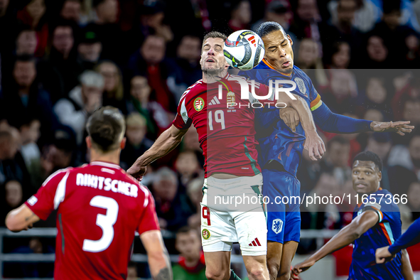 Hungary forward Barnabas Varga and Netherlands defender Virgil van Dijk play during the match between Hungary and the Netherlands at the Pus...