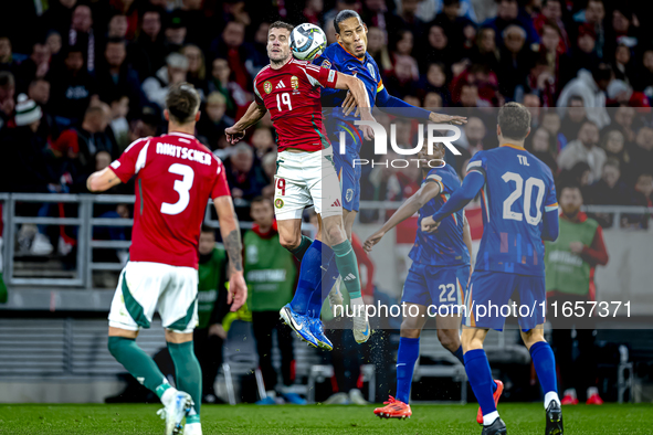 Hungary forward Barnabas Varga and Netherlands defender Virgil van Dijk play during the match between Hungary and the Netherlands at the Pus...