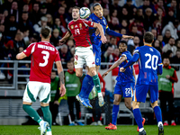 Hungary forward Barnabas Varga and Netherlands defender Virgil van Dijk play during the match between Hungary and the Netherlands at the Pus...