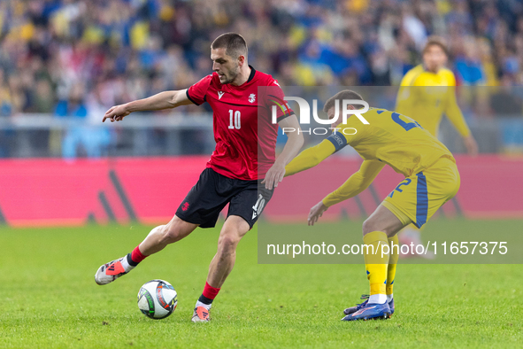 Giorgi Chakvetadze, Mykola Matviyenko are playing during the  UEFA Nations League 2024 League B Group B1 match between Ukraine and Georgia ,...