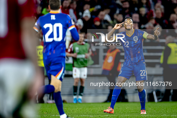 Netherlands defender Denzel Dumfries plays during the match between Hungary and the Netherlands at the Puskas Arena for the UEFA Nations Lea...