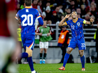 Netherlands defender Denzel Dumfries plays during the match between Hungary and the Netherlands at the Puskas Arena for the UEFA Nations Lea...