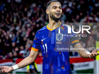 Netherlands forward Cody Gakpo plays during the match between Hungary and the Netherlands at the Puskas Arena for the UEFA Nations League se...