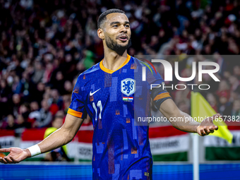 Netherlands forward Cody Gakpo plays during the match between Hungary and the Netherlands at the Puskas Arena for the UEFA Nations League se...