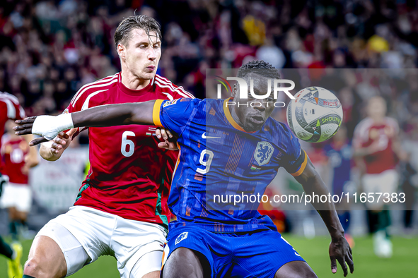 Hungary defender Willi Orban and Netherlands forward Brian Brobbey play during the match between Hungary and the Netherlands at the Puskas A...