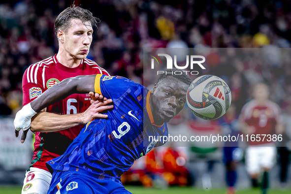 Hungary defender Willi Orban and Netherlands forward Brian Brobbey play during the match between Hungary and the Netherlands at the Puskas A...