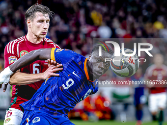 Hungary defender Willi Orban and Netherlands forward Brian Brobbey play during the match between Hungary and the Netherlands at the Puskas A...