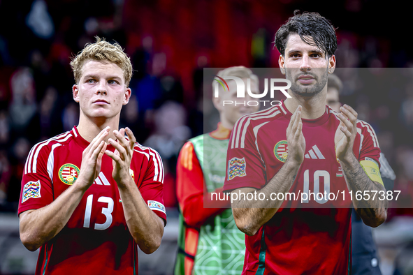 Hungary midfielders Andras Schafer and Dominik Szoboszlai play during the match between Hungary and the Netherlands at the Puskas Arena for...