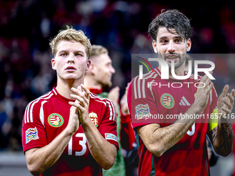 Hungary midfielders Andras Schafer and Dominik Szoboszlai play during the match between Hungary and the Netherlands at the Puskas Arena for...