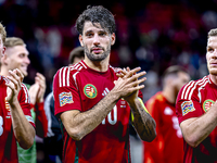 Hungary midfielders Andras Schafer, Dominik Szoboszlai, and Daniel Gera participate in the match between Hungary and the Netherlands at the...