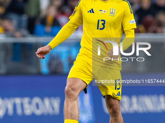 Illia Zabarnyi is  playing during the  UEFA Nations League 2024 League B Group B1 match between Ukraine and Georgia , at the Poznan Arena in...