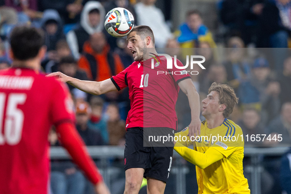 Giorgi Chakvetadze, Ivan Kaliuzhnyi are playing during the  UEFA Nations League 2024 League B Group B1 match between Ukraine and Georgia , a...