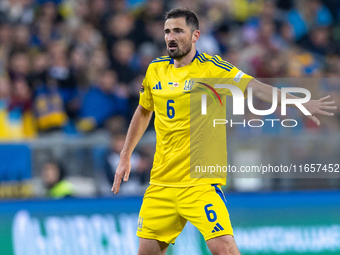 Ivan Kaliuzhnyi is playing during the  UEFA Nations League 2024 League B Group B1 match between Ukraine and Georgia , at the Poznan Arena in...