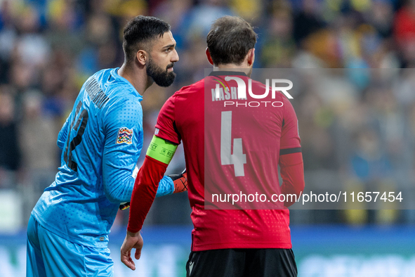 Giorgi Mamardashvili, Guram Kashia are playing during the  UEFA Nations League 2024 League B Group B1 match between Ukraine and Georgia , at...