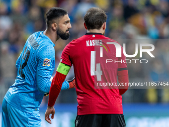 Giorgi Mamardashvili, Guram Kashia are playing during the  UEFA Nations League 2024 League B Group B1 match between Ukraine and Georgia , at...