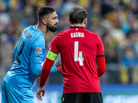 Giorgi Mamardashvili, Guram Kashia are playing during the  UEFA Nations League 2024 League B Group B1 match between Ukraine and Georgia , at...