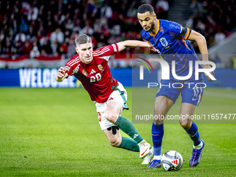 Hungary forward Roland Sallai and Netherlands forward Cody Gakpo participate in the match between Hungary and the Netherlands at the Puskas...