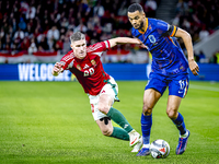 Hungary forward Roland Sallai and Netherlands forward Cody Gakpo participate in the match between Hungary and the Netherlands at the Puskas...