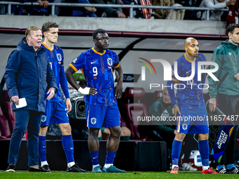 Netherlands trainer Ronald Koeman, Netherlands forward Brian Brobbey, and Netherlands forward Donyell Malen are present during the match bet...