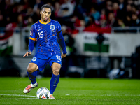 Netherlands midfielder Quinten Timber plays during the match between Hungary and the Netherlands at the Puskas Arena for the UEFA Nations Le...