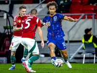 Netherlands forward Joshua Zirkzee and Hungary defender Bendeguz Bolla play during the match between Hungary and the Netherlands at the Pusk...