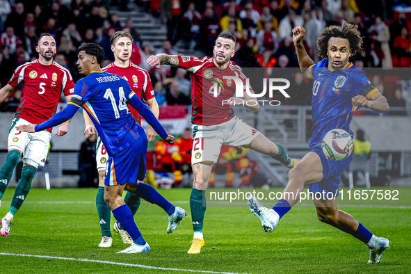 Hungary defender Endre Botka and Netherlands forward Joshua Zirkzee are present during the match between Hungary and the Netherlands at the...