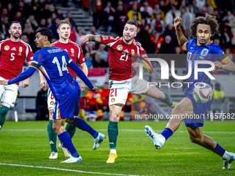 Hungary defender Endre Botka and Netherlands forward Joshua Zirkzee are present during the match between Hungary and the Netherlands at the...