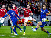 Hungary defender Endre Botka and Netherlands forward Joshua Zirkzee are present during the match between Hungary and the Netherlands at the...