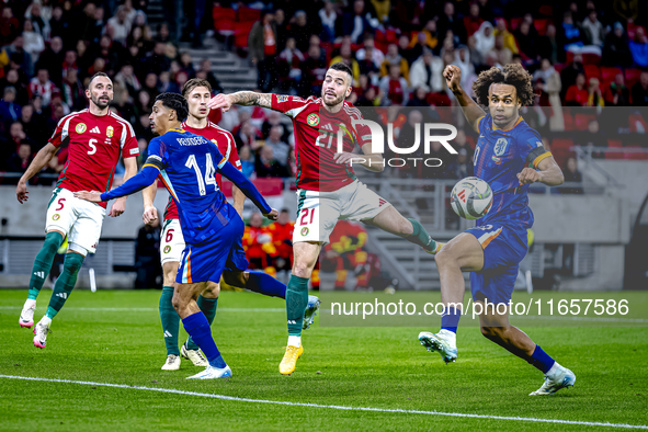 Hungary defender Endre Botka and Netherlands forward Joshua Zirkzee are present during the match between Hungary and the Netherlands at the...