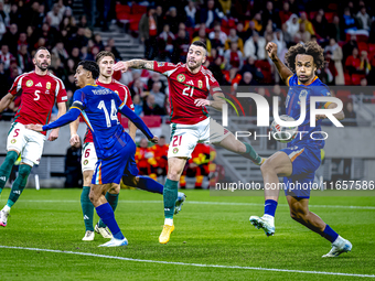 Hungary defender Endre Botka and Netherlands forward Joshua Zirkzee are present during the match between Hungary and the Netherlands at the...