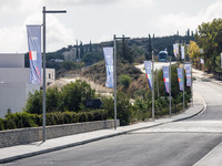 The flags of the participating countries are seen in Paphos, Cyprus, on October 11, 2024. The 11th Summit of the Southern EU Countries (MED9...