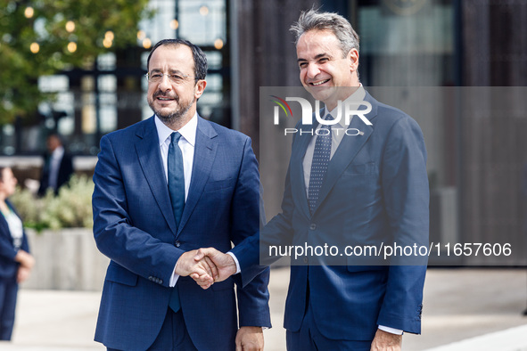 President of Cyprus Nikos Christodoulides welcomes the Greek Prime Minister Kyriakos Mitsotakis in Paphos, Cyprus, on October 11, 2024. The...