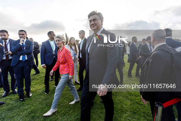 President of the European Commission Ursula von der Leyen and Prime Minister of Croatia Andrej Plenkovic leave the family photo area in Paph...