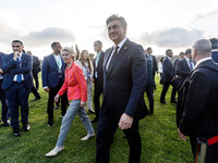 President of the European Commission Ursula von der Leyen and Prime Minister of Croatia Andrej Plenkovic leave the family photo area in Paph...