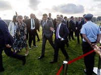 President of France Emmanuel Macron and Portugal Minister of Foreign Affairs Paulo Rangel leave the family photo area in Paphos, Cyprus, on...