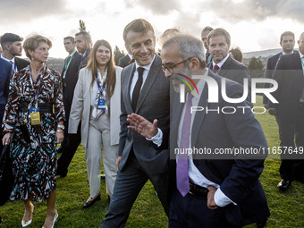 President of France Emmanuel Macron and Portugal Minister of Foreign Affairs Paulo Rangel leave the family photo area in Paphos, Cyprus, on...